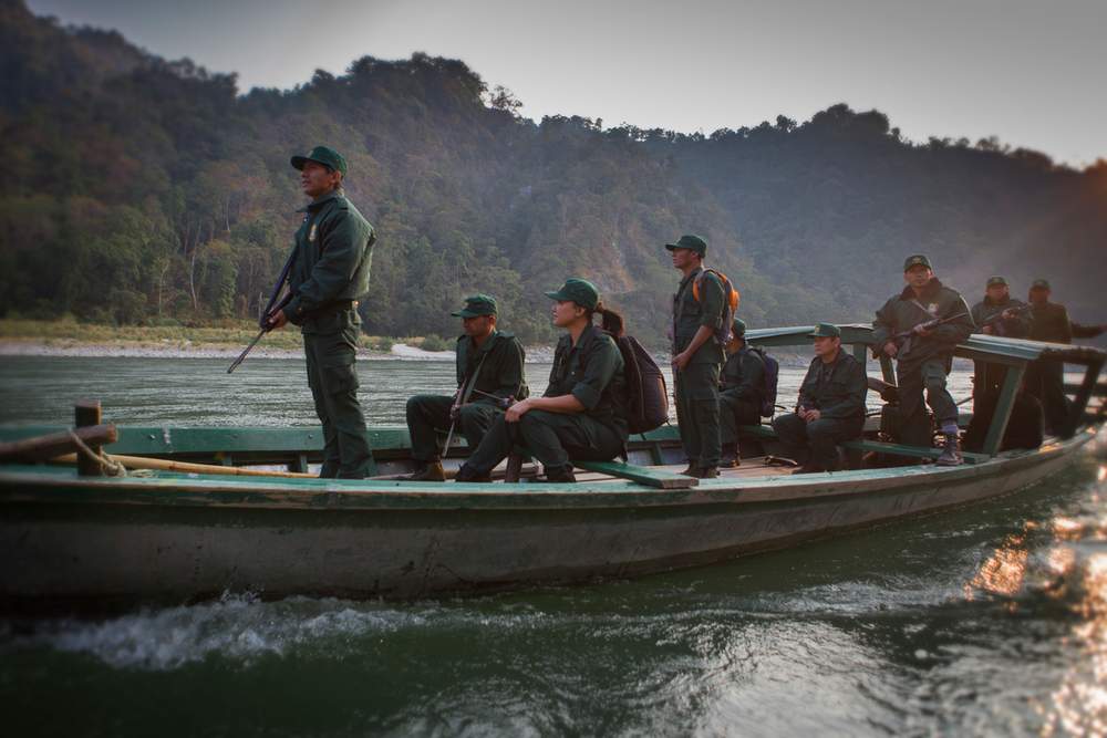 Singye Wangmo, Senior Forestry Officer at Royal Manas National Park, leads her team of rangers on boat patrol.&amp;nbsp;