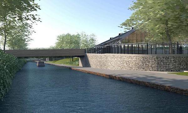 The new foot\/cycle bridge across the Basingstoke canal joins our site to Woking town centre