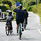 A family cycle down a country road