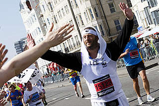 Team Panda - running in onesie - Copyright Tristan Fewings Team Panda - running in onesie