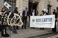 WWF-UK's Vote Earth petition being handed to Secretary of State Ed Miliband MP at the Dept of Energy and Climate Change, 10 Dec 2009