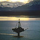 Twilight view of oil rig off coast of Alaska, United States.