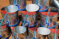 Watering cans on sale in the market