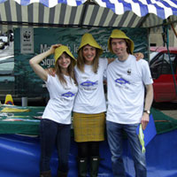 Volunteers at farmers market - More Fish