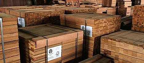 Finished, processed certified wood stacked and labelled with details of species and final destination.
