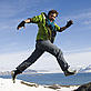UK Ambassador for Change, Casper ter Kuile, jumping over rocks in Spitsbergen, Norway - © Sindre Kinnerod / WWF-Canon UK Ambassador for Change, Casper ter Kuile, jumping over rocks in Spitsbergen, Norway