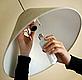 Save energy - fit energy efficient light bulbs - © Ben Ealovega / WWF UK Changing light bulb © Ben Ealovega / WWF UK