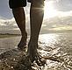 Paddling on beach - © WWF-Canon / Chris Martin BAHR Paddling on beach