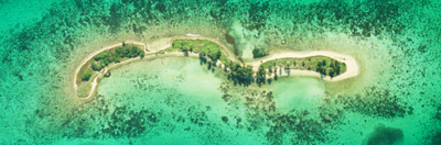 Laughing Bird Caye National Park Aerial view of coral reef from 6,000 ft. Belize
