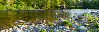 Scottish river and fishermen