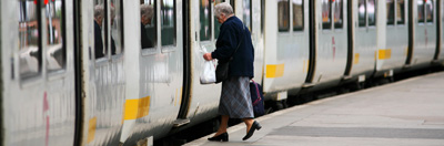 Woman boarding a train
