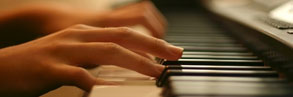 Hands playing piano