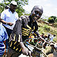 Farmers in Chimala are trained in measuring the flow and quantity of water used for rice irrigation, Tanzania