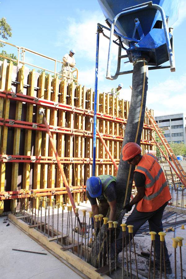 Pouring concrete on-site during construction