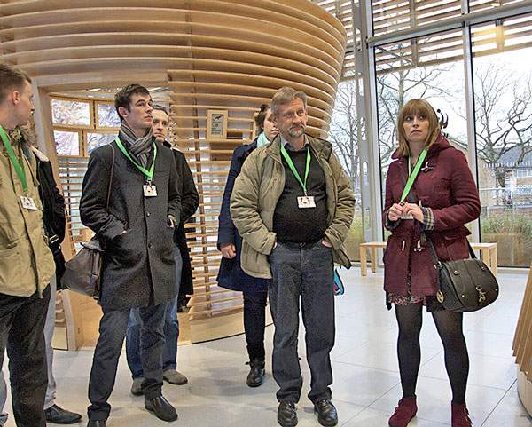 Business guests on a tour of the building – in this case from Granit chartered architects