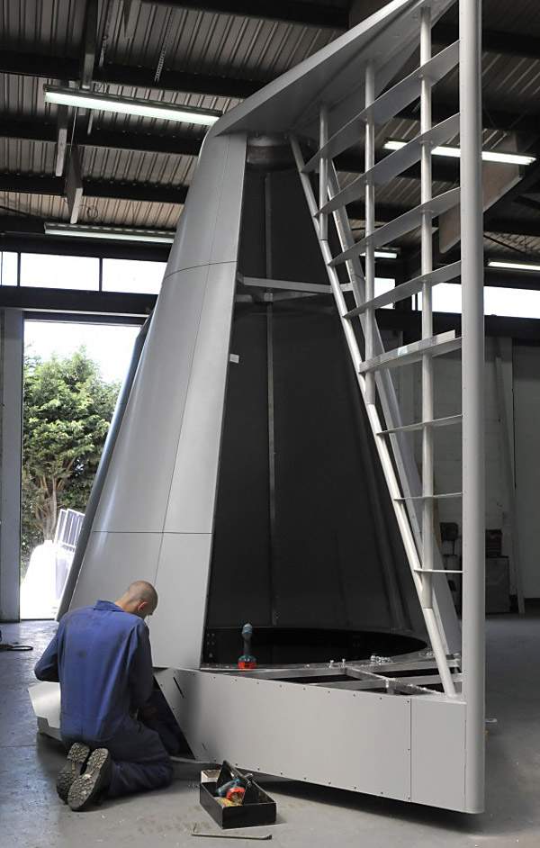 One of our 4m-high aluminium wind cowls, designed by Fläkt Wood, being assembled by specialist engineers at ASGB